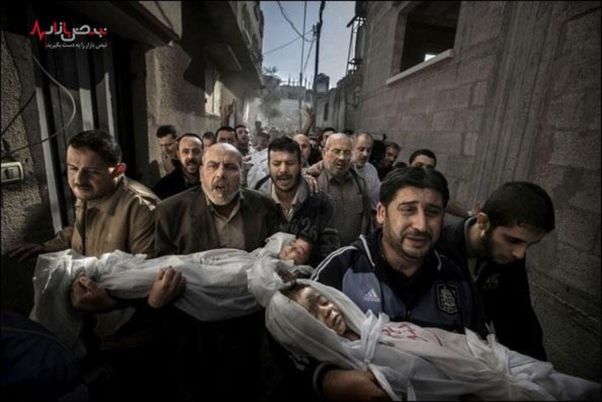 ببینید/ جمع آوری اعضای بدن قربانیان بیمارستان غزه