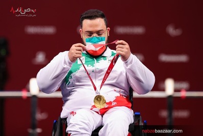 روح الله رستمی مدال طلای وزنه برداری